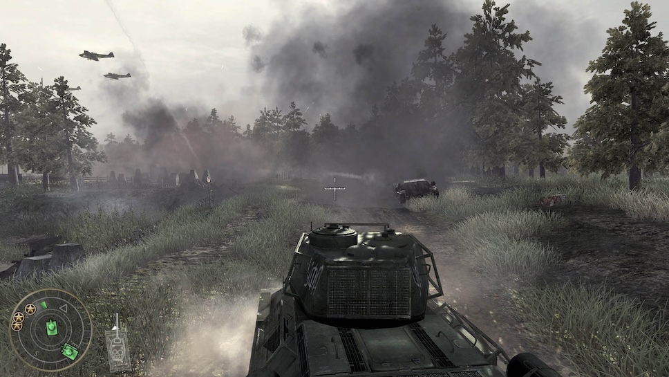 The player is controlling a Russian tank, in the third person. They are moving down a dirt track behind another tank. There is a lot of smoke and two Russian planes flying overhead.