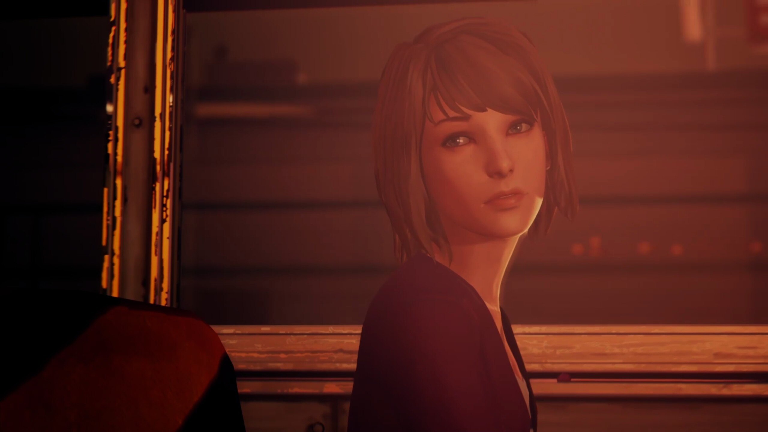 Max Caulfield in a bus looking to the left